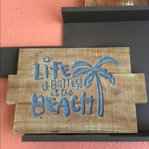 Hand carved wood plaque.